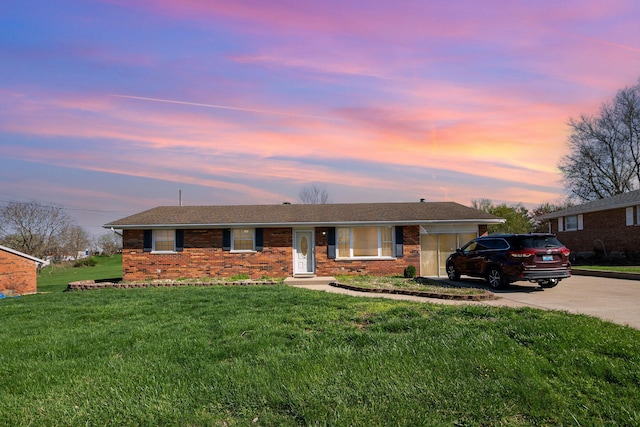 9 Blanche Ave, Williamstown, KY 41097 - ranch-style home with concrete driveway, a front yard, and brick siding