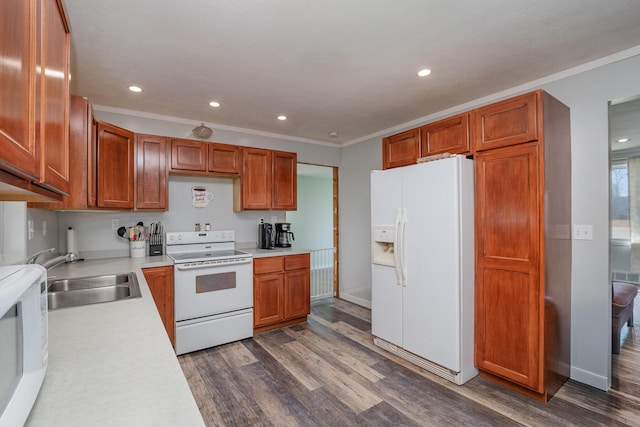 9 Blanche Ave, Williamstown, KY 41097 - kitchen featuring white appliances, ornamental molding, dark wood-style flooring, light countertops, and a sink