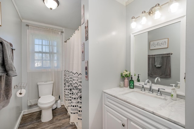 9 Blanche Ave, Williamstown, KY 41097 - bathroom featuring crown molding, vanity, toilet, wood finished floors, and baseboards