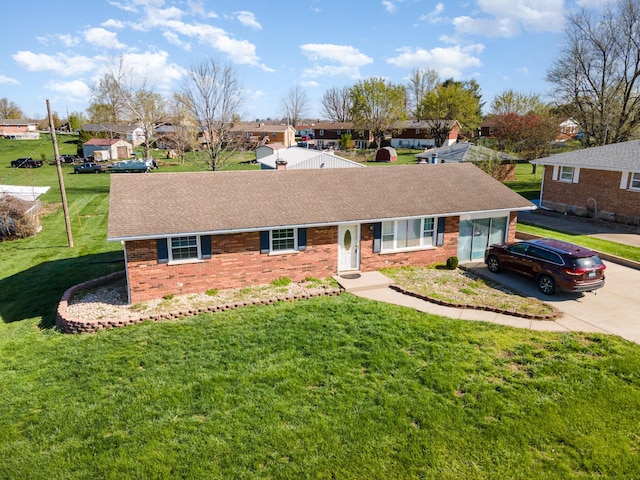 9 Blanche Ave, Williamstown, KY 41097 - ranch-style home with concrete driveway, brick siding, an attached garage, and a front lawn