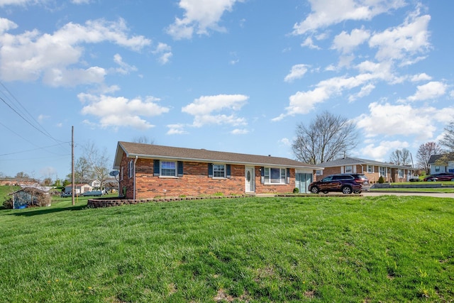 9 Blanche Ave, Williamstown, KY 41097 - ranch-style house with brick siding and a front lawn