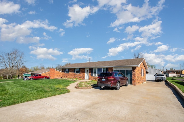 9 Blanche Ave, Williamstown, KY 41097 - ranch-style house with concrete driveway, brick siding, and a front lawn