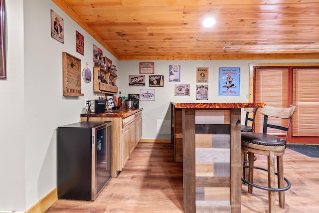 130 The Village Dr, Nancy, KY 42544 - bar with a dry bar, light wood-type flooring, baseboards, and wood ceiling