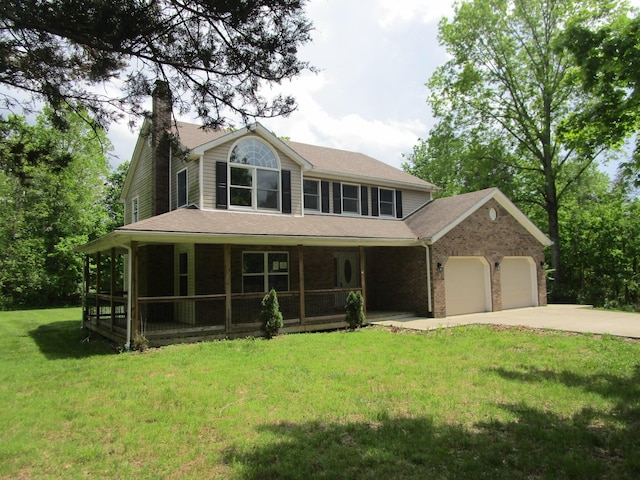 596 Overlook Dr, Lancaster, KY 40444 - view of front of home featuring a chimney, a garage, a porch, concrete driveway, and a front lawn