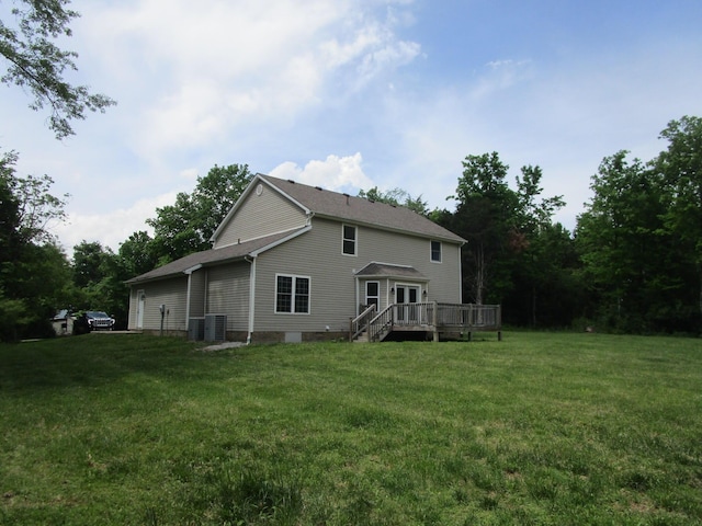596 Overlook Dr, Lancaster, KY 40444 - rear view of property featuring a deck, a lawn, and central AC