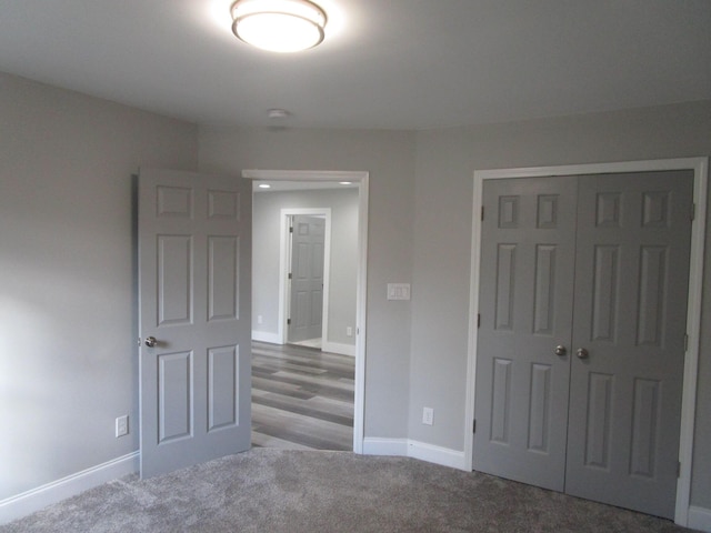 596 Overlook Dr, Lancaster, KY 40444 - unfurnished bedroom with a closet, baseboards, and carpet floors