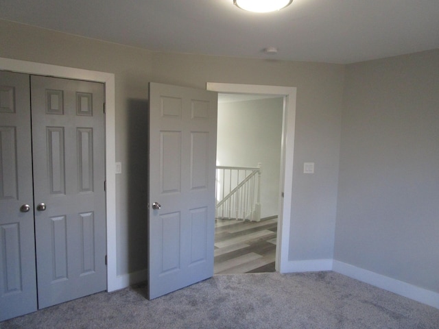 596 Overlook Dr, Lancaster, KY 40444 - unfurnished bedroom featuring carpet, baseboards, and a closet