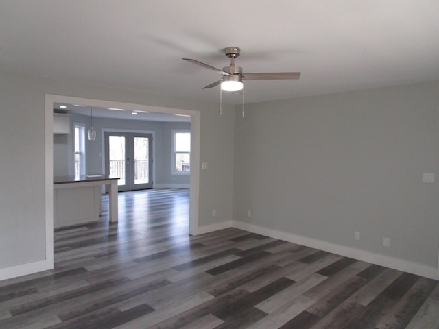 596 Overlook Dr, Lancaster, KY 40444 - empty room featuring dark wood-style floors, ceiling fan, and baseboards