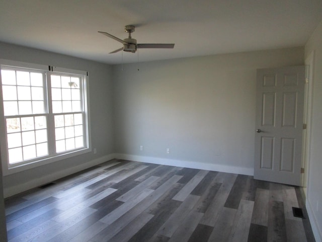 596 Overlook Dr, Lancaster, KY 40444 - spare room featuring a ceiling fan, wood finished floors, and baseboards