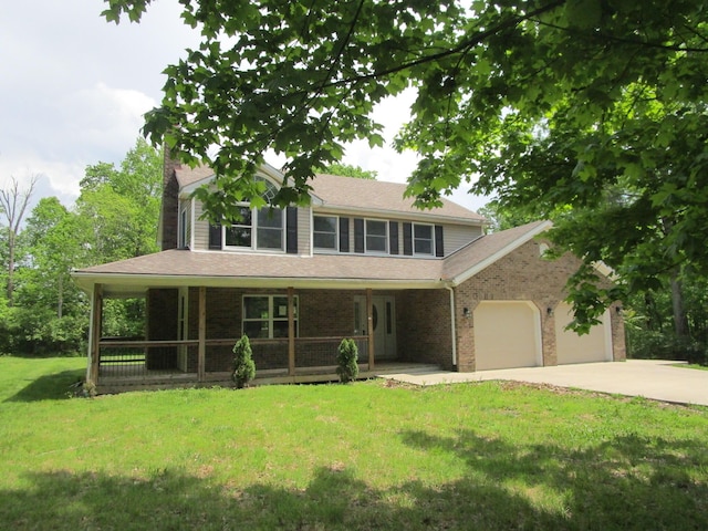 596 Overlook Dr, Lancaster, KY 40444 - view of front of property with a porch, a garage, driveway, a front yard, and brick siding
