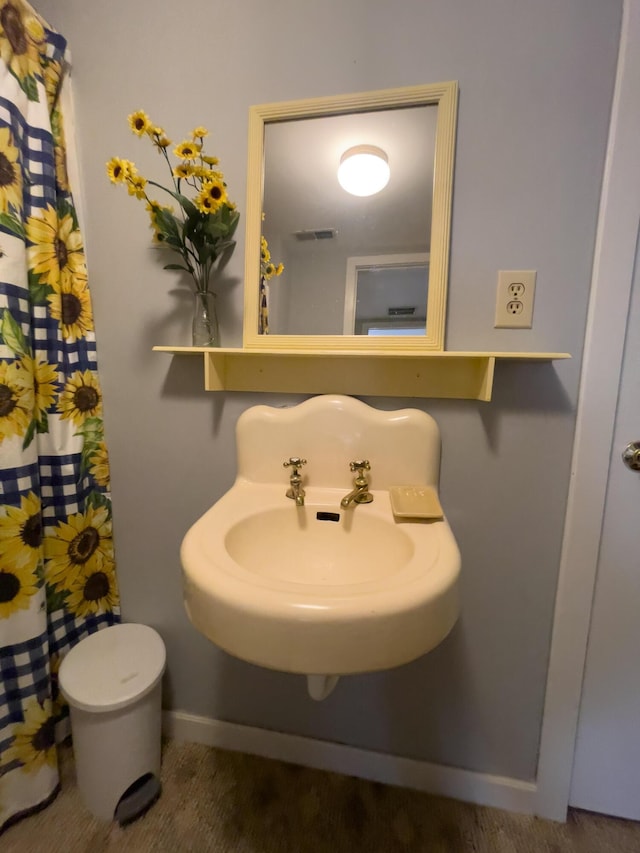 350 Wilderness Ln, Morehead, KY 40351 - full bathroom featuring visible vents, baseboards, a sink, and a shower with curtain