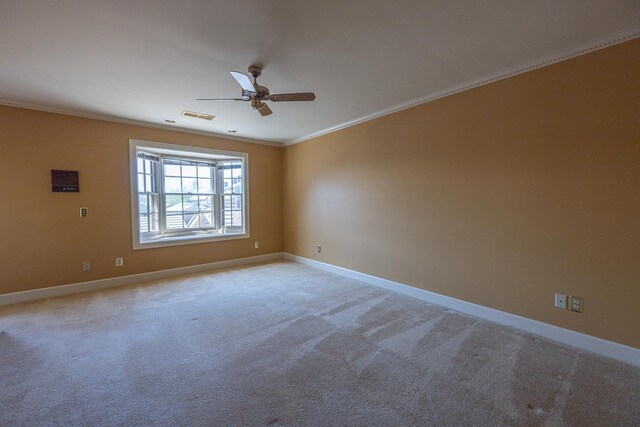 400 Redding Rd Unit 15, Lexington, KY 40517 - empty room with visible vents, baseboards, ornamental molding, a ceiling fan, and light colored carpet
