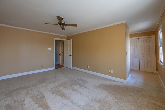 400 Redding Rd Unit 15, Lexington, KY 40517 - carpeted spare room with crown molding, baseboards, a ceiling fan, and visible vents