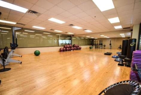 400 Redding Rd Unit 15, Lexington, KY 40517 - gym with a paneled ceiling, wood finished floors, and visible vents