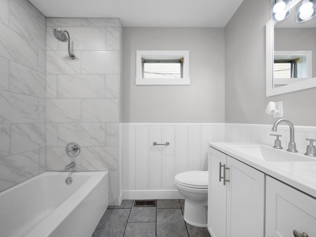 513 Washington Ave, Paintsville, KY 41240 - full bath featuring vanity, tile patterned floors, toilet, shower / bathtub combination, and visible vents
