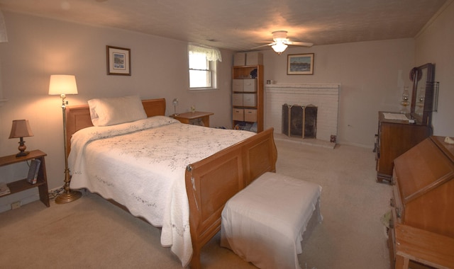 198 Hiawatha Trl, Georgetown, KY 40324 - bedroom featuring light colored carpet, a brick fireplace, a ceiling fan, and baseboards
