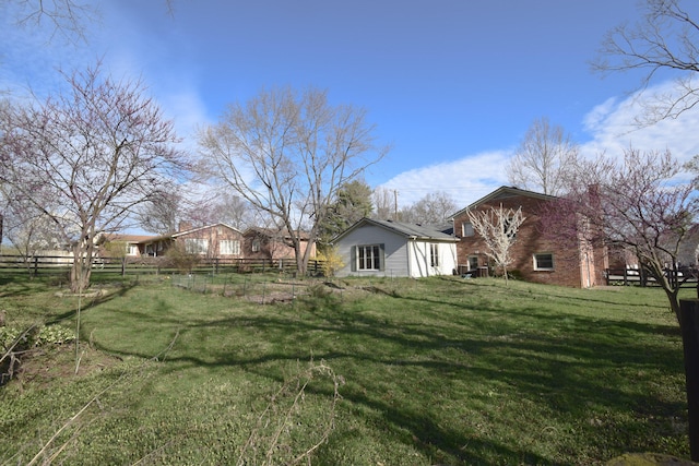 view of yard with fence