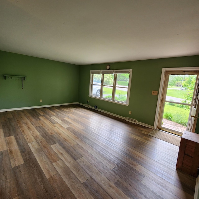 198 Hiawatha Trl, Georgetown, KY 40324 - unfurnished living room featuring dark wood-style flooring and baseboards