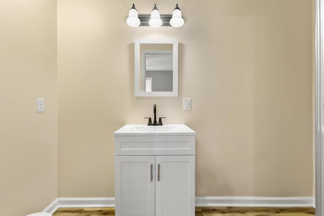 280 Main St, Salt Lick, KY 40371 - bathroom featuring vanity, wood finished floors, and baseboards