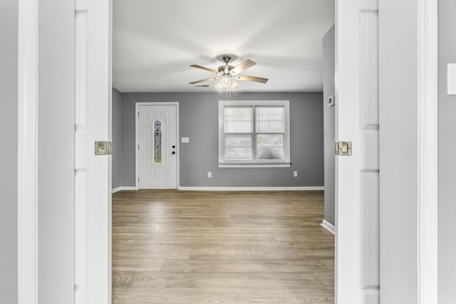 280 Main St, Salt Lick, KY 40371 - foyer with a ceiling fan, baseboards, and light wood-style floors