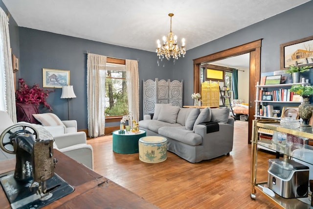 309 W Columbia St, Somerset, KY 42501 - living room featuring a chandelier and wood finished floors