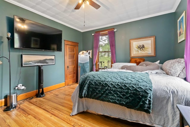 309 W Columbia St, Somerset, KY 42501 - bedroom with ceiling fan, baseboards, ornamental molding, and wood finished floors
