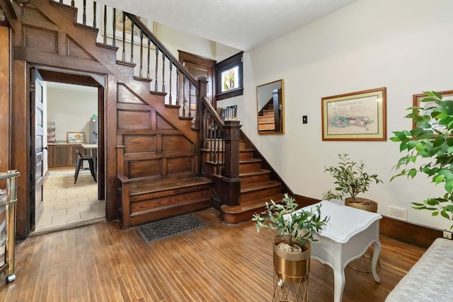 309 W Columbia St, Somerset, KY 42501 - stairway with visible vents and wood finished floors