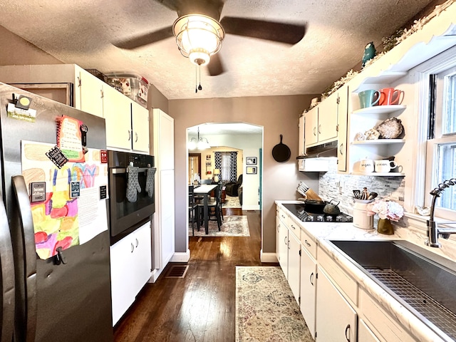 3473 Grundy Rd, Somerset, KY 42501 - kitchen with freestanding refrigerator, oven, a sink, arched walkways, and a ceiling fan