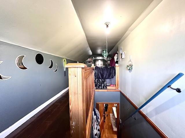 3473 Grundy Rd, Somerset, KY 42501 - staircase featuring wood finished floors, vaulted ceiling, and baseboards