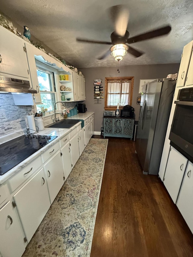 3473 Grundy Rd, Somerset, KY 42501 - kitchen featuring a sink, stainless steel fridge with ice dispenser, oven, dark wood-type flooring, and healthy amount of natural light