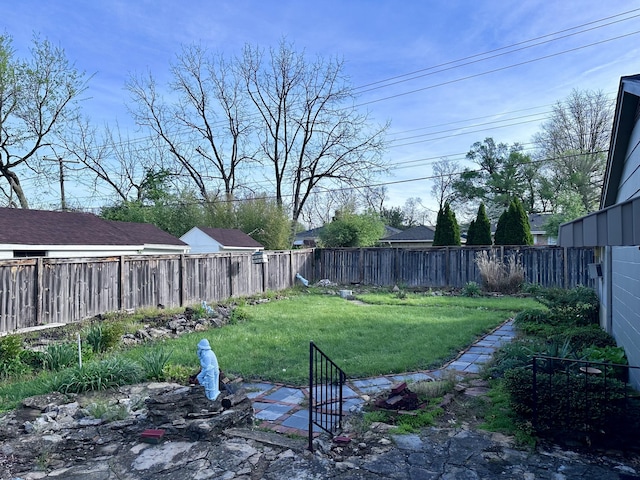view of yard featuring a fenced backyard