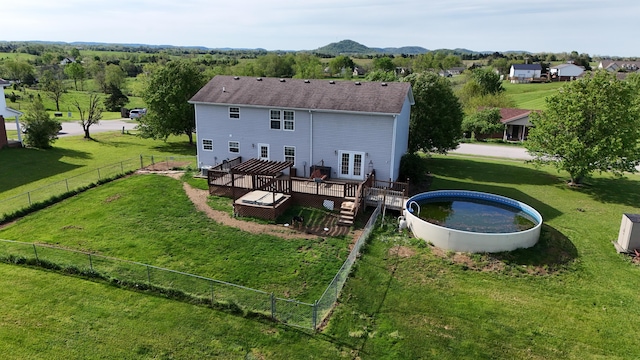 305 Saddle Wood Ct, Berea, KY 40403 - rear view of property with a deck, a fenced backyard, and a lawn