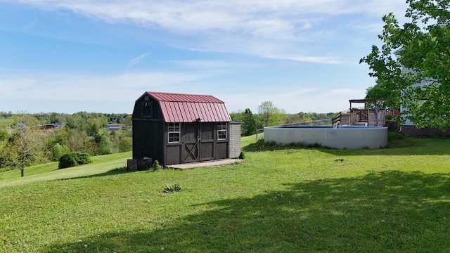 305 Saddle Wood Ct, Berea, KY 40403 - view of yard with a storage unit and an outbuilding