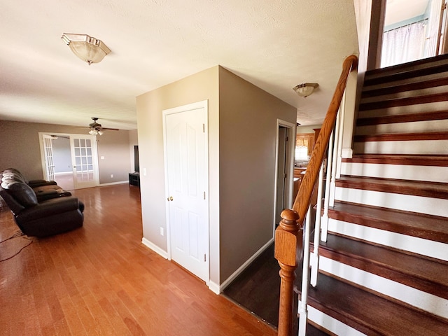 305 Saddle Wood Ct, Berea, KY 40403 - stairway with baseboards, wood finished floors, and a ceiling fan