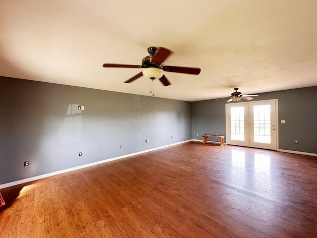 305 Saddle Wood Ct, Berea, KY 40403 - spare room featuring wood finished floors, ceiling fan, and baseboards