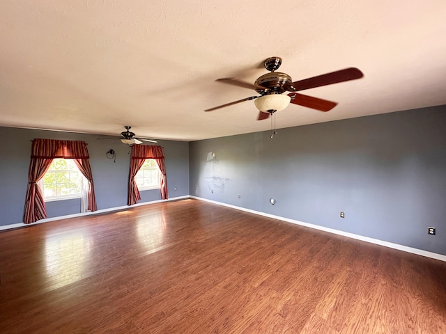 305 Saddle Wood Ct, Berea, KY 40403 - empty room featuring baseboards, wood finished floors, and ceiling fan