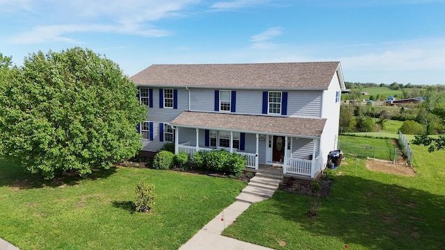 305 Saddle Wood Ct, Berea, KY 40403 - view of front of home with fence, a front yard, a porch, and a shingled roof
