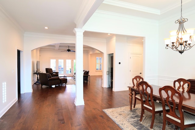 2524 Pascoli Pl, Lexington, KY 40509 - dining room featuring arched walkways, crown molding, ceiling fan, dark wood-type flooring, and a chandelier