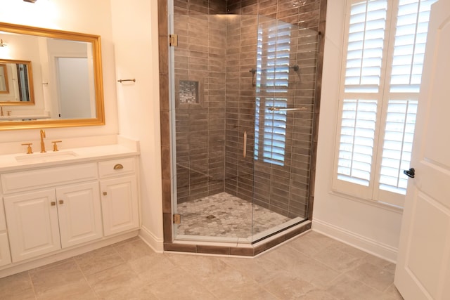 2524 Pascoli Pl, Lexington, KY 40509 - full bathroom featuring a shower stall, vanity, baseboards, and tile patterned flooring