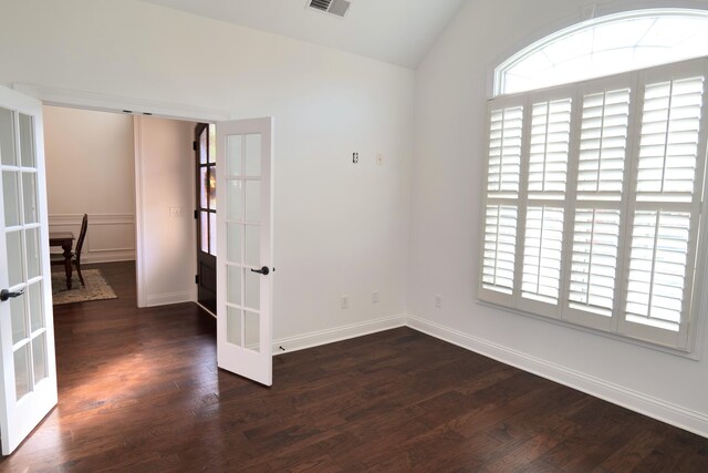 2524 Pascoli Pl, Lexington, KY 40509 - spare room featuring french doors, vaulted ceiling, dark wood-type flooring, and baseboards