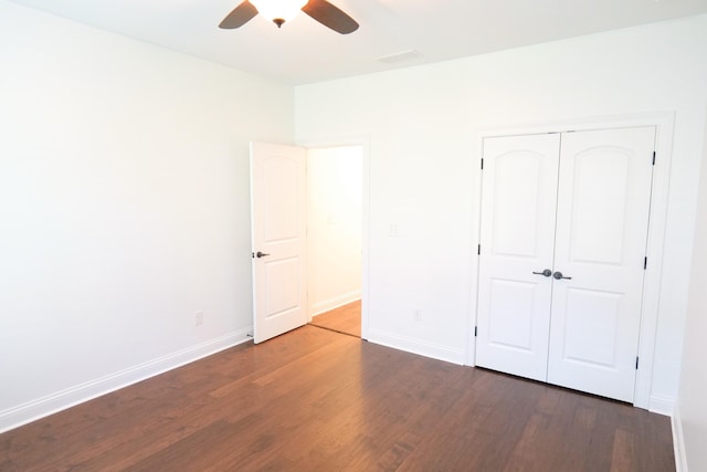 2524 Pascoli Pl, Lexington, KY 40509 - unfurnished bedroom featuring wood finished floors, baseboards, a closet, and a ceiling fan