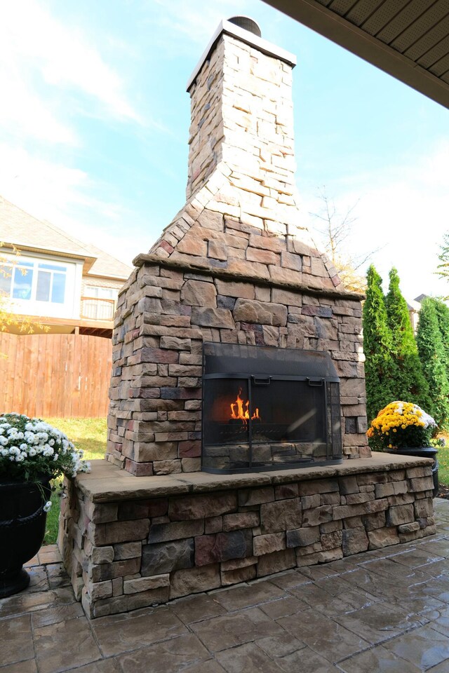 2524 Pascoli Pl, Lexington, KY 40509 - view of patio with an outdoor stone fireplace