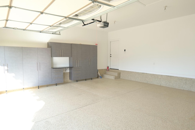 2524 Pascoli Pl, Lexington, KY 40509 - garage featuring a garage door opener and an office area