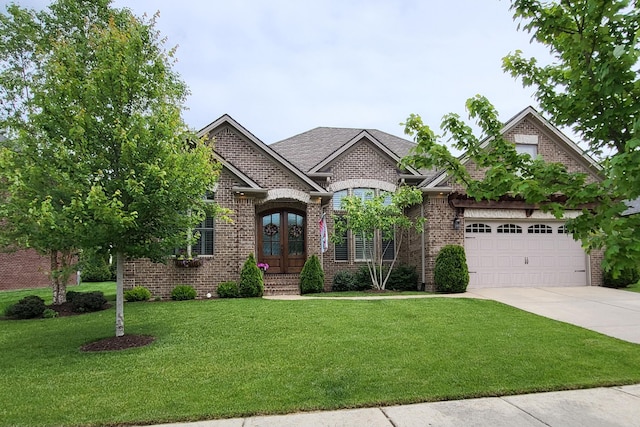 2524 Pascoli Pl, Lexington, KY 40509 - french country home with french doors, concrete driveway, a front yard, a garage, and brick siding