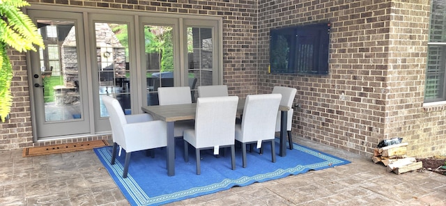 2524 Pascoli Pl, Lexington, KY 40509 - dining space with brick wall