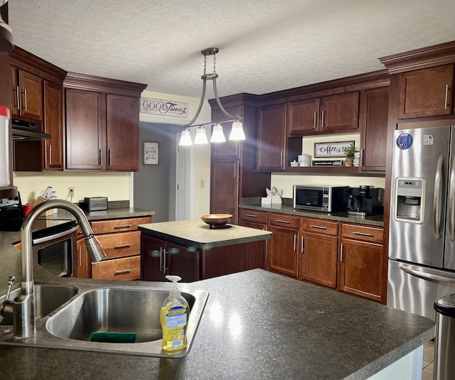 111 Keystone Dr, Richmond, KY 40475 - kitchen with a kitchen island, under cabinet range hood, appliances with stainless steel finishes, dark countertops, and a sink