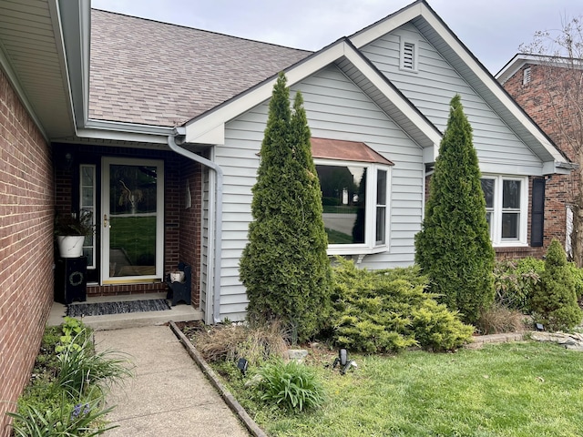 111 Keystone Dr, Richmond, KY 40475 - view of exterior entry featuring brick siding and a shingled roof