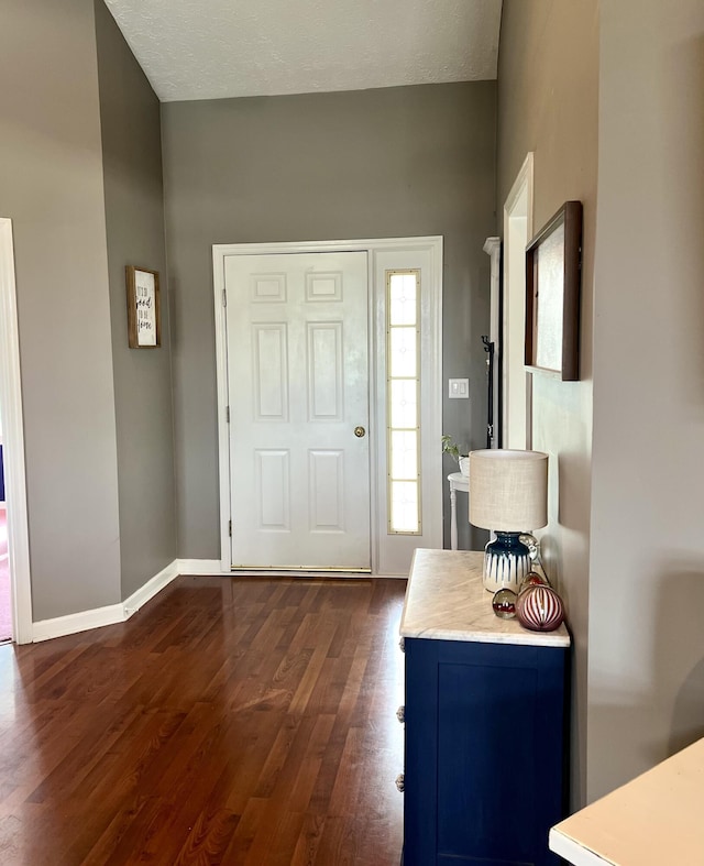 111 Keystone Dr, Richmond, KY 40475 - foyer entrance featuring dark wood-type flooring, baseboards, and a textured ceiling