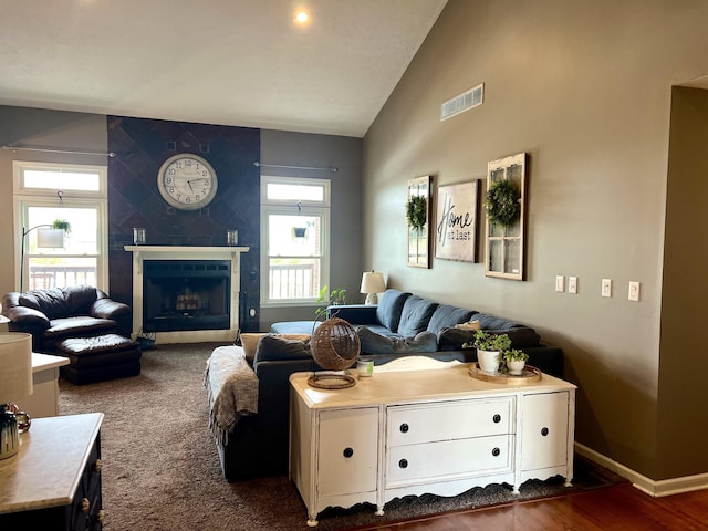 111 Keystone Dr, Richmond, KY 40475 - living room with high vaulted ceiling, a tile fireplace, visible vents, and baseboards