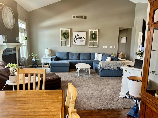 111 Keystone Dr, Richmond, KY 40475 - living room with a fireplace, visible vents, vaulted ceiling, and wood finished floors